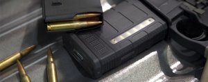 A 25-round 7.62x51 NATO (.308 Winchester) AR10 magazine featuring transparent windows to allow rapid visual identification.